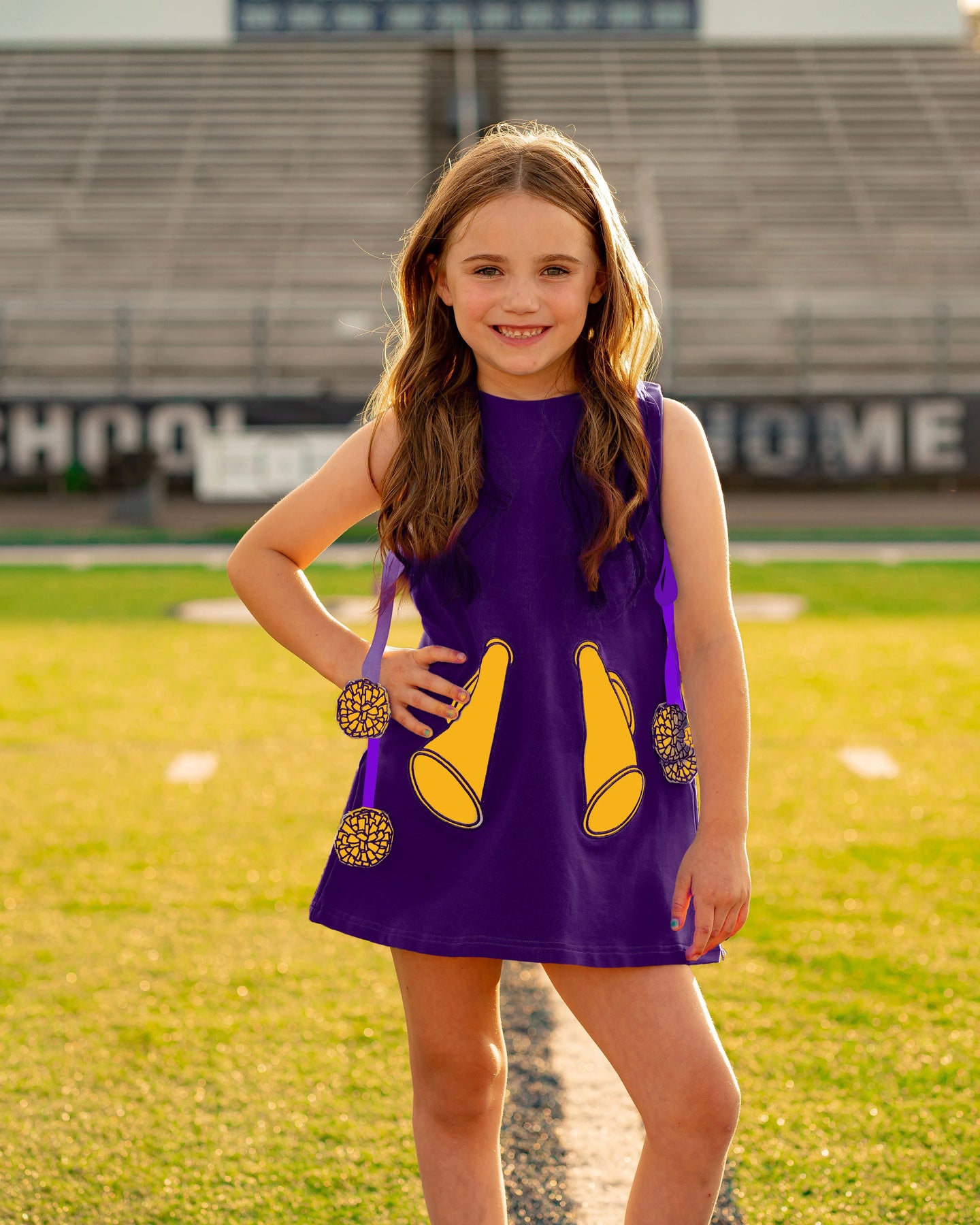 game day purple dress Yellow Lamb Girls Game Day Tiered Dress - Gold Footballs